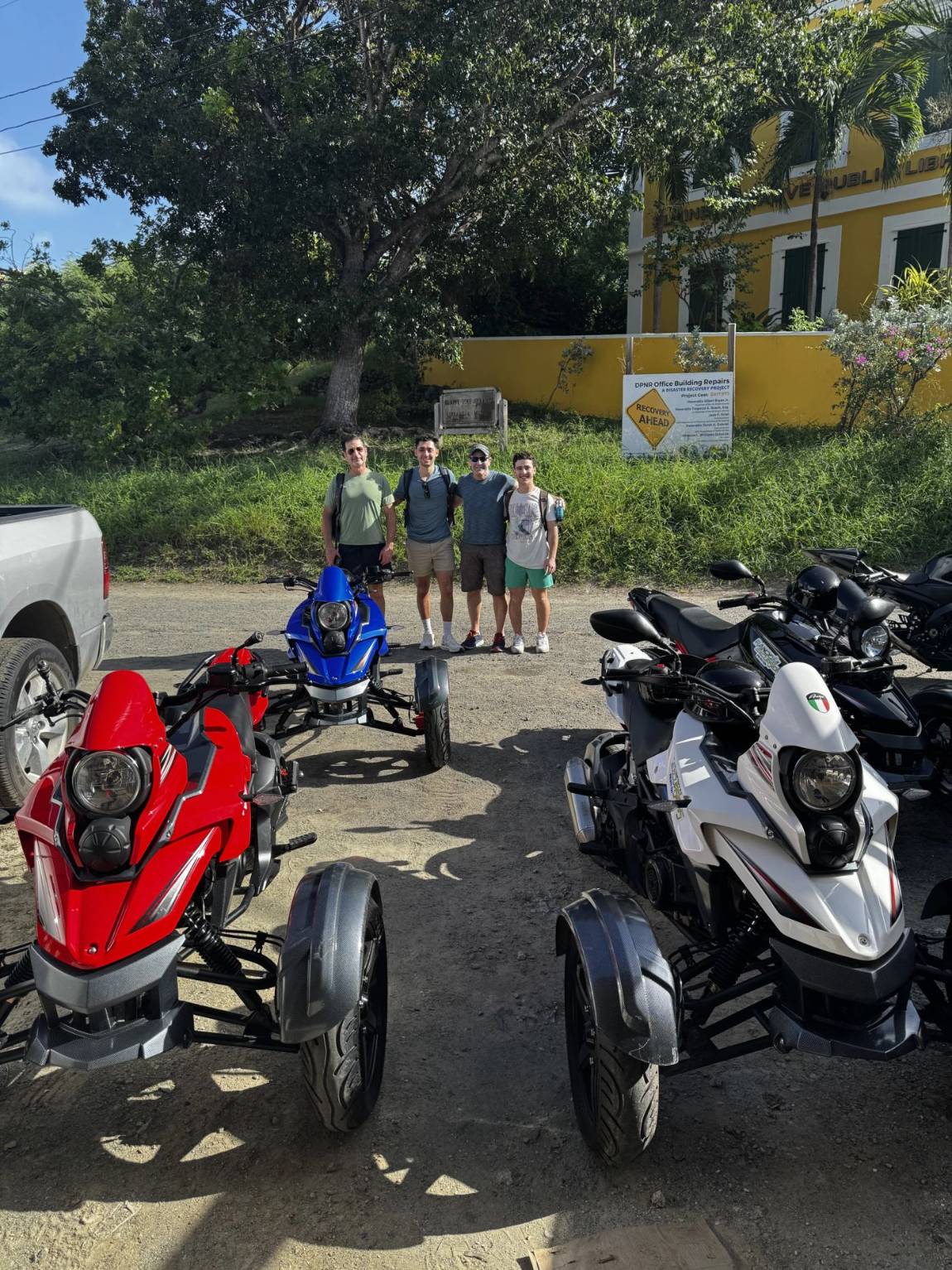 Guests gathered with their trikes for the pre-ride safety briefing on St. John