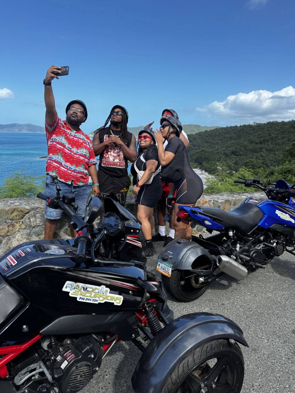 A group selfie with trikes on a St. John road