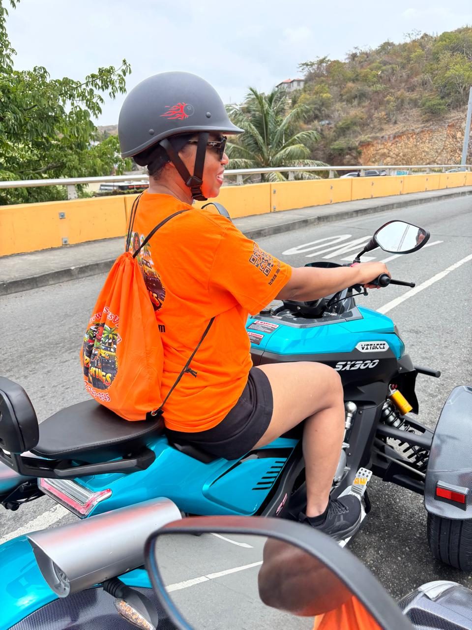 A rider on a blue Vitacci SX300 Super Trike during the guided tour