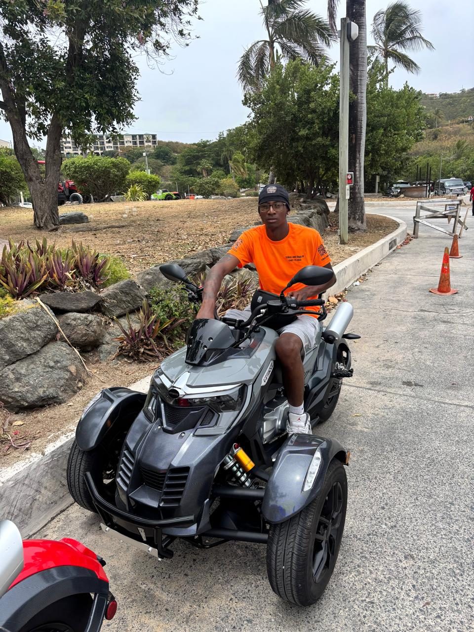 A guide on a three-wheel Super Trike on a St. Thomas road