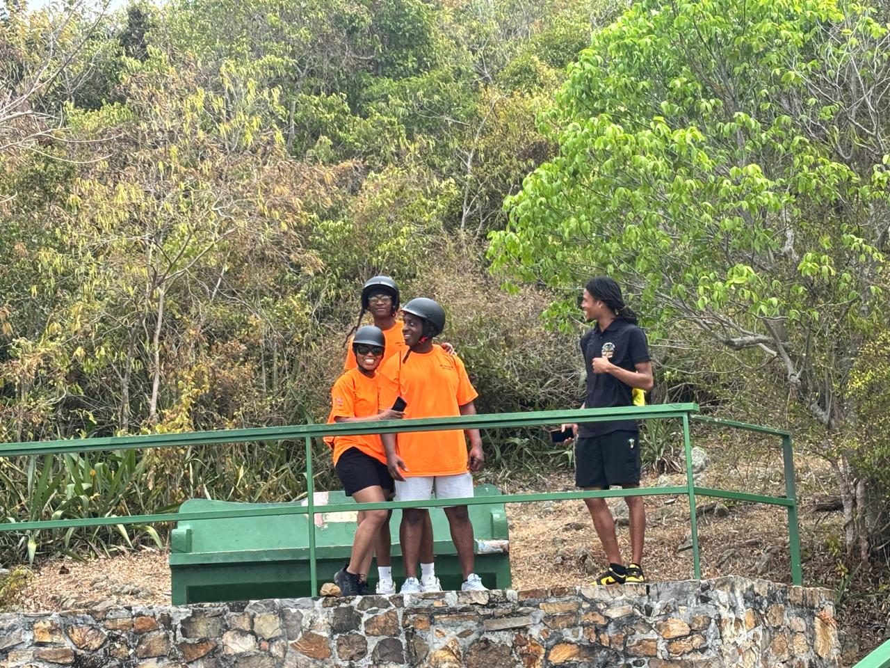 Guests relaxing at a lookout with their guide