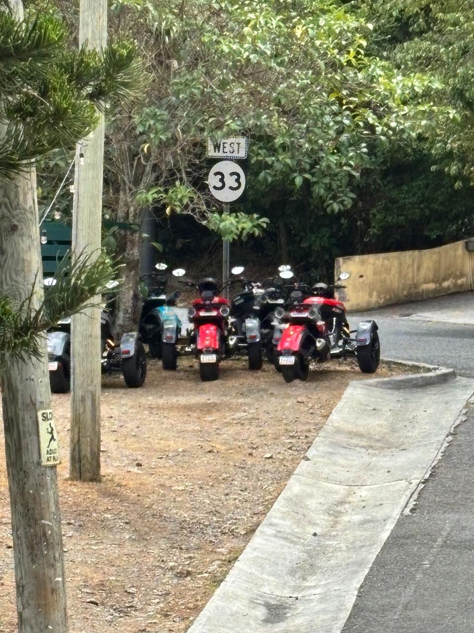 Trikes parked along the island's scenic West route